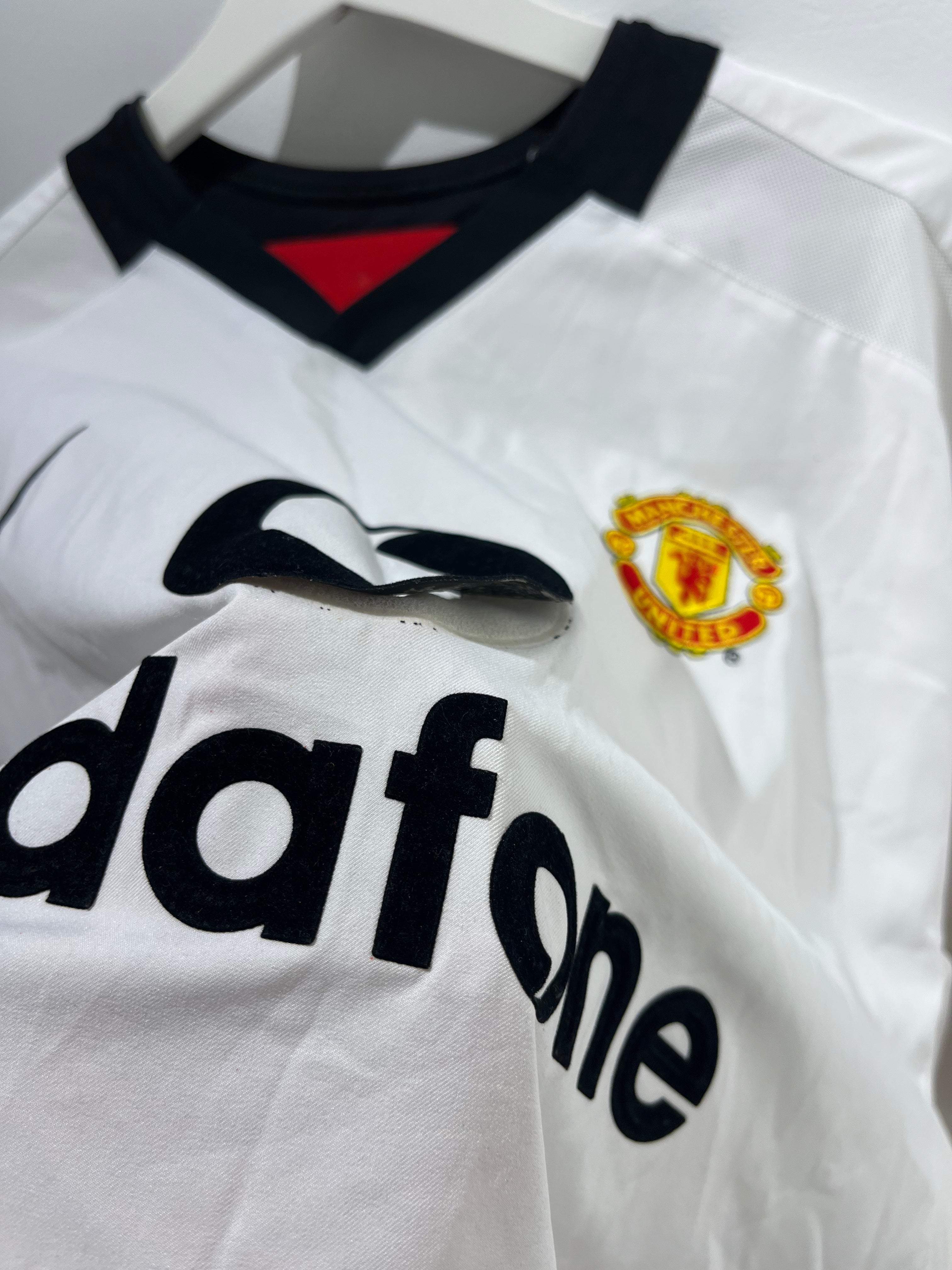 Detaljeret kig på Manchester United ude 2002/04 XL logo og sponsor