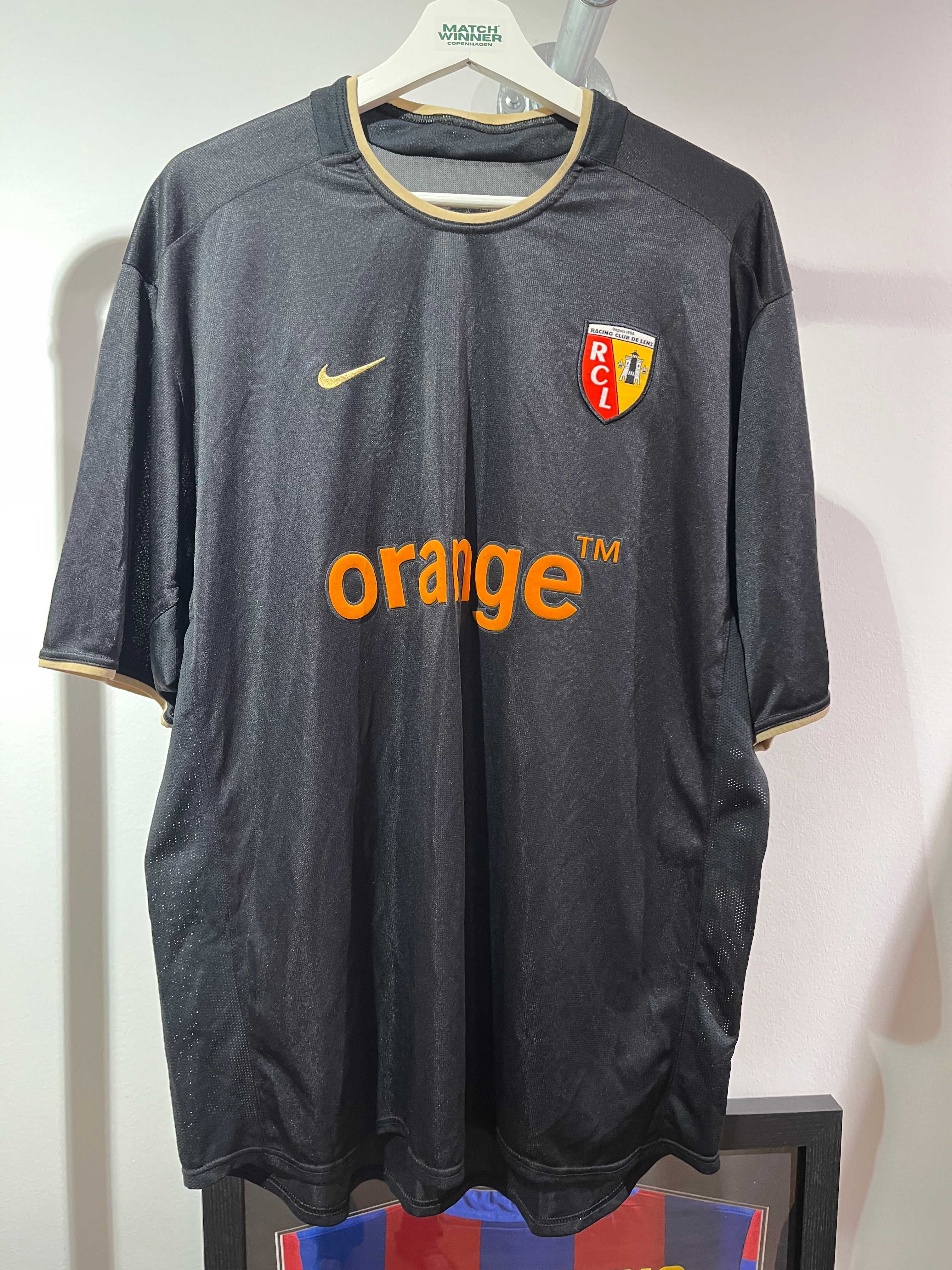 Racing Club de Lens 2002-03 Ude XL fodboldtrøje i sort med det klassiske klublogo og Orange sponsor.